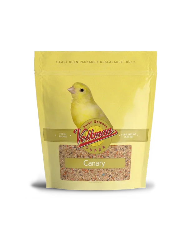 A yellow bird sitting on top of some food.